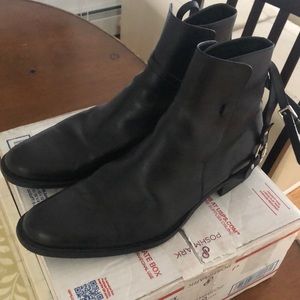 Size 12 Gucci Leather boots with small buckle.